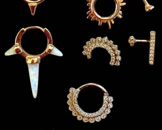 Over 30 single gold and diamond ear cuffs and single earrings for multiple piercings. These are gorgeous and one of a kind - many custom