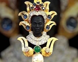 Gorgeous vintage blackamoor brooch. The quality for this costume piece is outstanding!