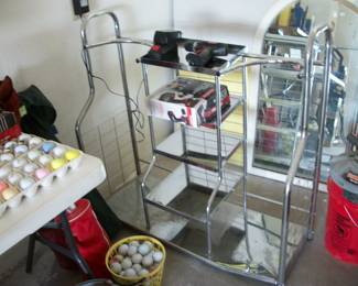 GOLF BALLS, SHOP VAC, WICKER MIRROR