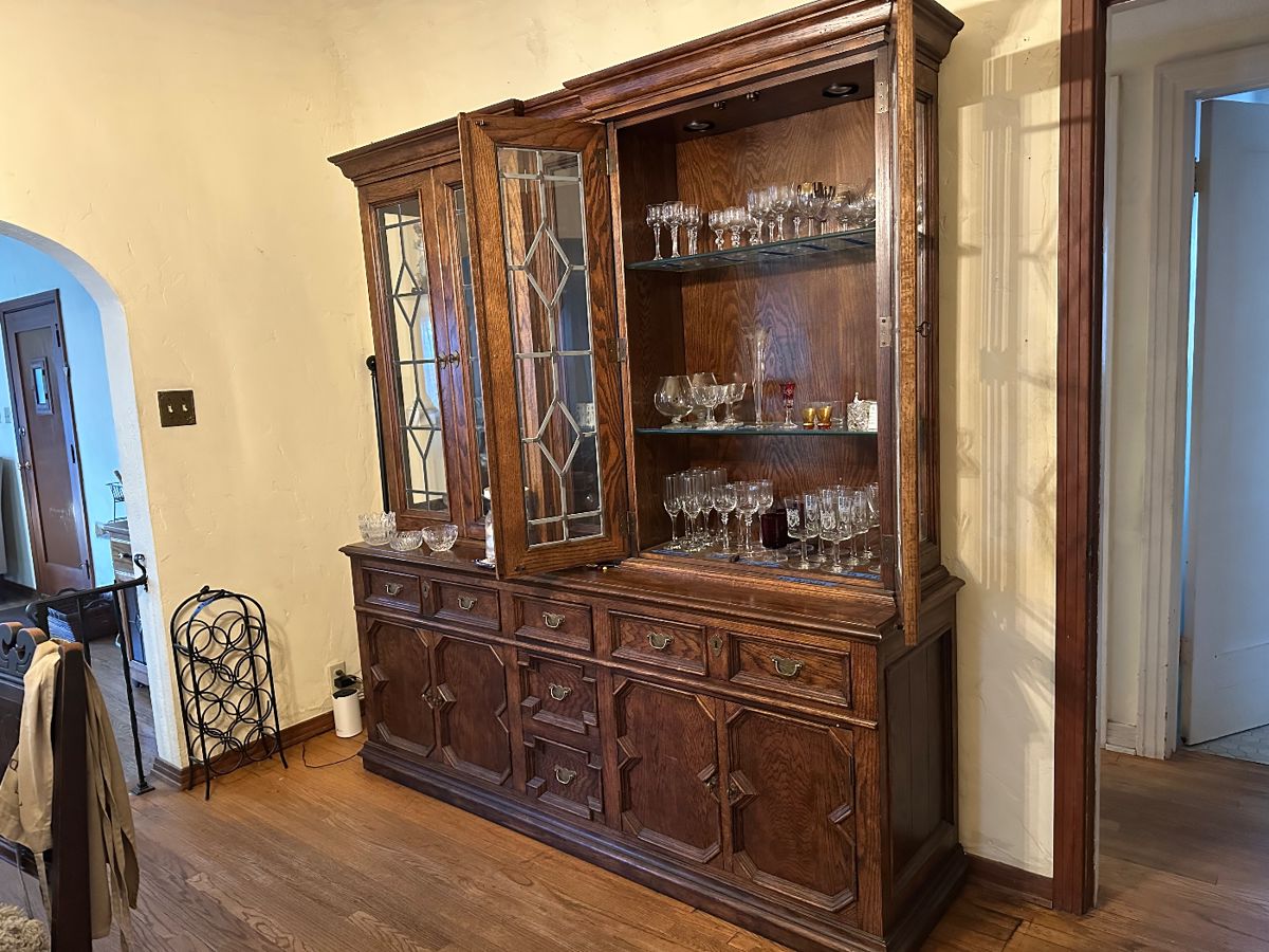 Stunning China cabinet with glass doors and built-in lighting. Just offscreen - the dining room table & chairs.