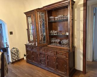Stunning China cabinet with glass doors and built-in lighting. Just offscreen - the dining room table & chairs.