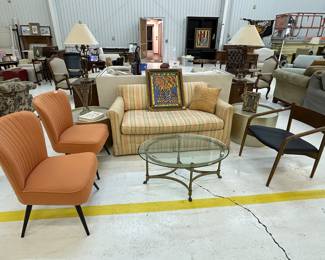 Hickory Furniture co striped love seat, iron glass top coffee table, pair of orange mid century chairs, Article mid century arm chair, pair of silver drum end tables