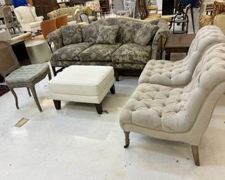 Camel back Chippendale sofa, square ottoman, pair of armless upholstered chairs