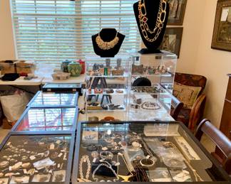INCLUDING SIGNED PIECES AND COSTUME JEWELRY FROM DIFFERENT ERAS.