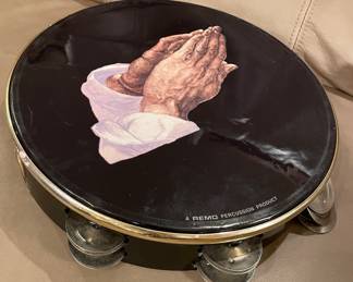 Praying hands tambourin from the BABTIST WOMENS GROUP performances/comedy 