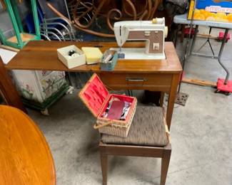 SEWING MACHINE AND ATTACHMENTS