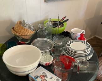 Lots of dishes and kitchen 