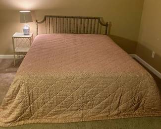 Bed, bedside table and lamp