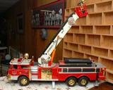 N.Y.F.D. SNORKEL UNIT FIRE TOY TRUCK & FIRE BELL ON WALL