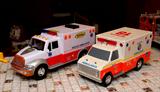 2 RESCUE TOY TRUCKS