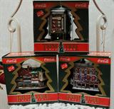 Huge selection of Department 56 Coke Cola ornaments in original boxes