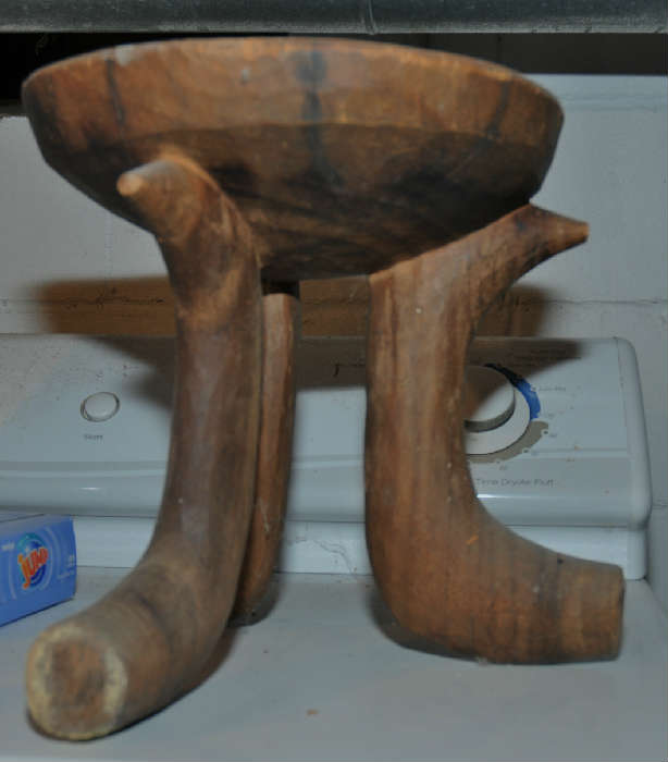 ONE OF TWO MATCHING AFRICAN STOOLS