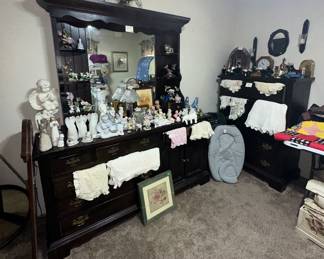 Pine Dresser With Mirror; Pine Chest of Drawers; Angel Figurines; Animal Figurines; Doilies; Pack n Play; Avon Decanters; GE Radio with Heritage GE7-4100J; Howard Miller Quartz Desk Clock; Lefton Figures; Homco Figures