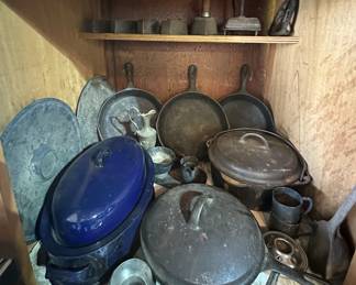 Cast Iron Skillets; Wagner Cast Iron Dutch Oven #8 Lid with Handle; Sad Irons; Blue Enamelware Roaster; Cast Iron Ladle; Silver Plated Cups/ Trays