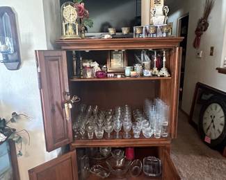 Entertainment Center; Sony LCD Digital 32in TV; Howard Miller Anniversary Clock; Princess House Glassware; Candles and Candle Holders