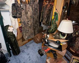 Camo Clothings; Overalls; Coats; Waders; Sleeping Bag; Hunting Vest; Mallard Duck Desk Phone; Fish Desk Lamp; Winchester Ammo Box
