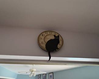 Cat clock sold