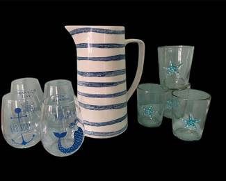 Stripped ceramic pitcher, stemless wine glasses, hand blown glasses