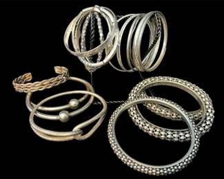 Costume jewelry bangle bracelets 
Twisted rope bracelet on left is sterling
  and sold separately 