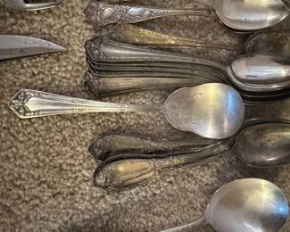 silver plate utensil sets in several patterns