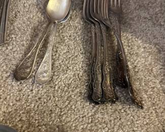 silver plate utensil sets in several patterns