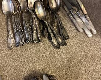silver plate utensil sets in several patterns