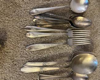 silver plate utensil sets in several patterns