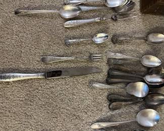 silver plate utensil sets in several patterns