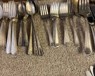 silver plate utensil sets in several patterns