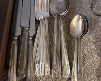 silver plate utensil sets in several patterns