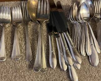 silver plate utensil sets in several patterns