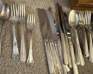 silver plate utensil sets in several patterns