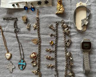 Vintage charm bracelets, watches and costume jewelry