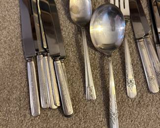 silver plate utensil sets in several patterns