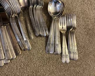 silver plate utensil sets in several patterns