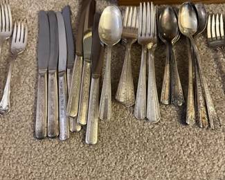 silver plate utensil sets in several patterns