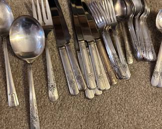 silver plate utensil sets in several patterns