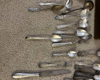 silver plate utensil sets in several patterns