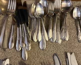 silver plate utensil sets in several patterns