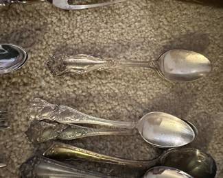 silver plate utensil sets in several patterns