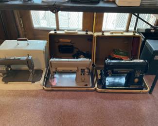 Sewing machine with cases