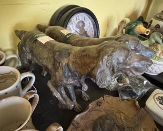 Solid bronze bird dogs