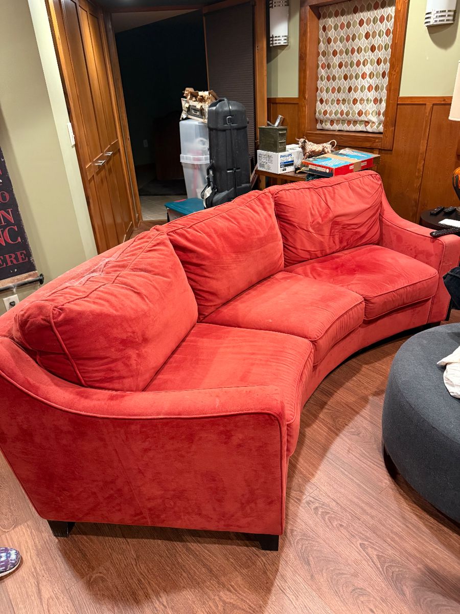 Orange curved sofa