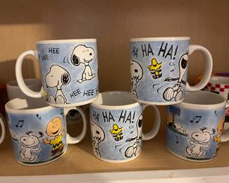 Assorted Snoopy mugs with Woodstock and Charlie Brown