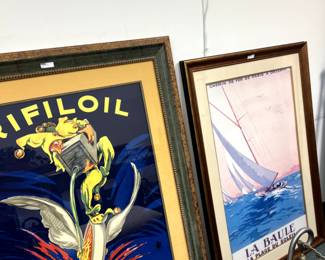 A wall lined with great framed posters!