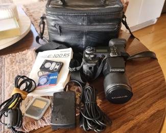 Olympus Camedia E-100 RS digital camera, along with its accessories