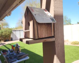 wood and license plate birdhouse