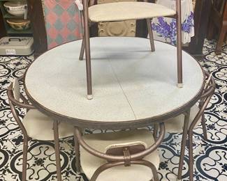Adorable 1950’s atomic Cosco child’s folding table and four chairs in excellent condition!