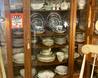 Oak curved front China cabinet with sidelights, adjustable shelves and working skeleton key lock