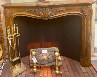 Carved fireplace mantle/surround
Brass cannonball andirons
Brass fireplace tool set